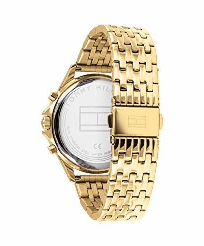 Vista trasera de un reloj dorado con correa de eslabones.